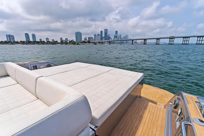 Slide: The Image of Luxury 2023 Pardo Yachts 50 with city skyline and bridge in the background. - 30