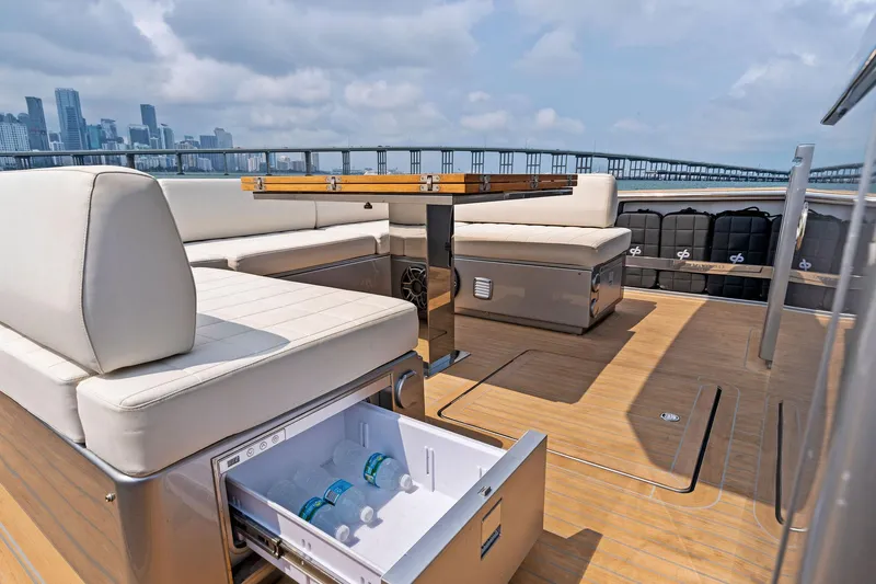 Slide: The Image of Luxurious deck of 2023 Pardo Yachts 50 with seating and built-in cooler. - 38