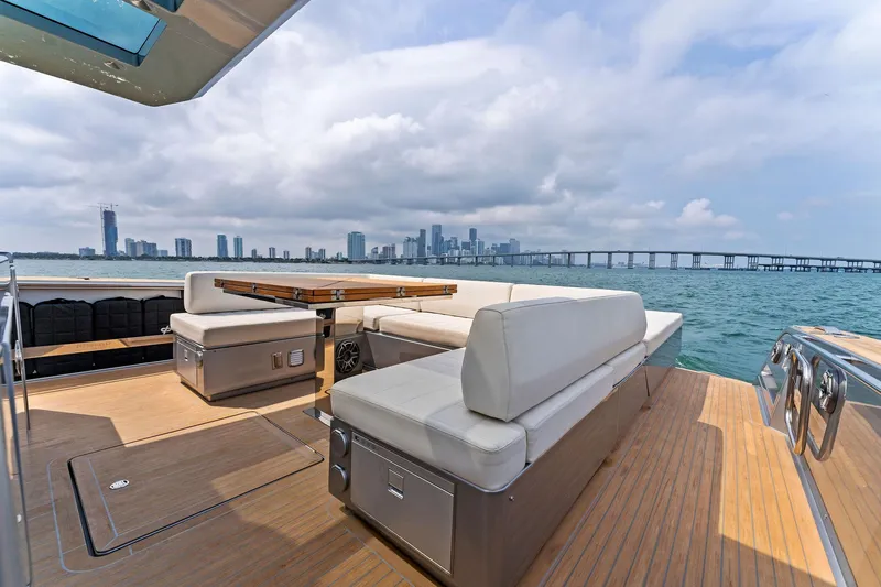 Slide: The Image of Luxury deck of 2023 Pardo Yachts 50 with city skyline and bridge view. - 40