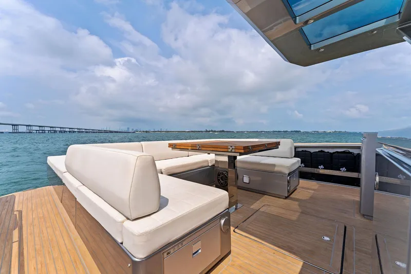 Slide: The Image of 2023 Pardo Yachts 50 model, spacious deck with seating and ocean view. - 41