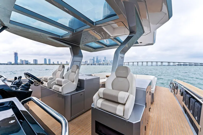 Slide: The Image of 2023 Pardo Yachts 50 with luxurious seating and panoramic views on the water. - 45