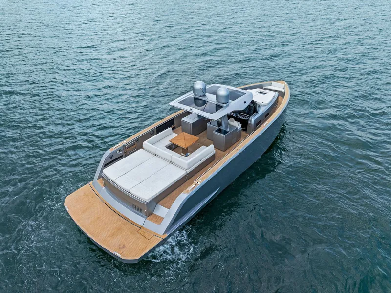 Slide: The Image of 2023 Pardo Yachts 50 cruising on open water, showcasing luxurious deck and seating area. - 8