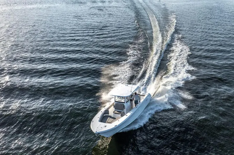 Slide: The Image of 2025 Sea Hunt GAMEFISH 28 cruising on open water. - 5