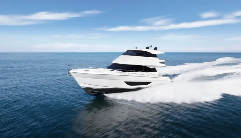 The Image of 2026 Maritimo M55 yacht cruising on open sea under clear blue sky. - 0