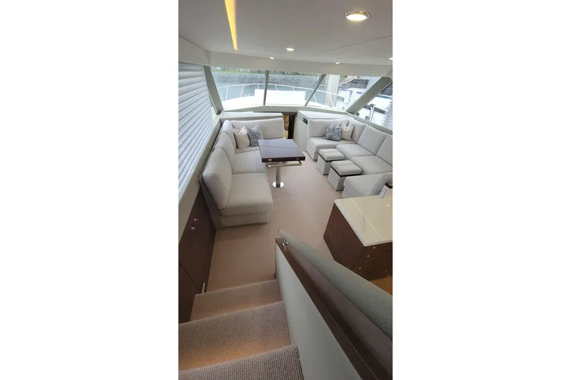 Slide: The Image of Luxurious interior of 2026 Maritimo M55 yacht with elegant seating and modern design. - 20