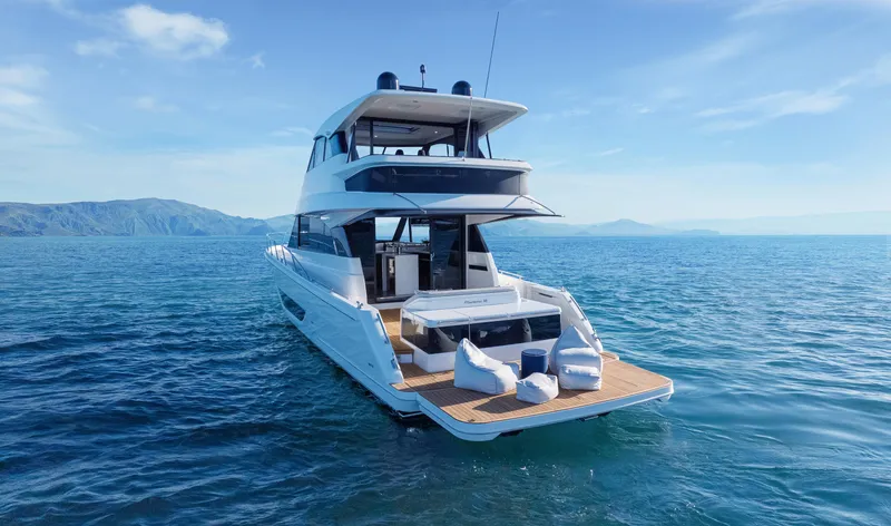 Slide: The Image of Luxury Maritimo M55 yacht cruising on open sea, 2026 model. - 3