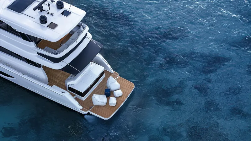 Slide: The Image of Luxury Maritimo M55 yacht on clear blue water, 2026 model, aerial view. - 4
