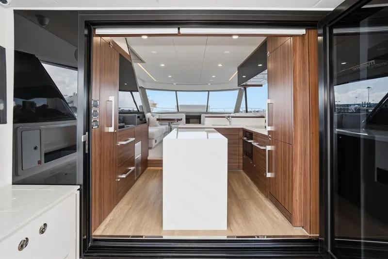 Slide: The Image of Luxurious interior of 2026 Maritimo M55 yacht with modern kitchen design. - 49