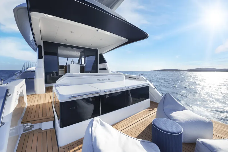 Slide: The Image of Luxury Maritimo M55 yacht deck with ocean view, 2026 model. - 5