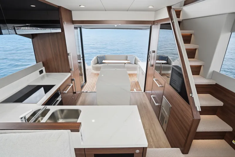 Slide: The Image of Luxurious interior of 2026 Maritimo M55 yacht with modern kitchen and ocean view. - 51