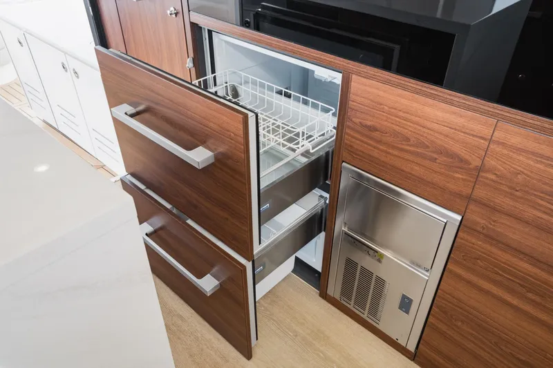 Slide: The Image of Luxury kitchen drawers and appliances in 2026 Maritimo M55 yacht. - 54