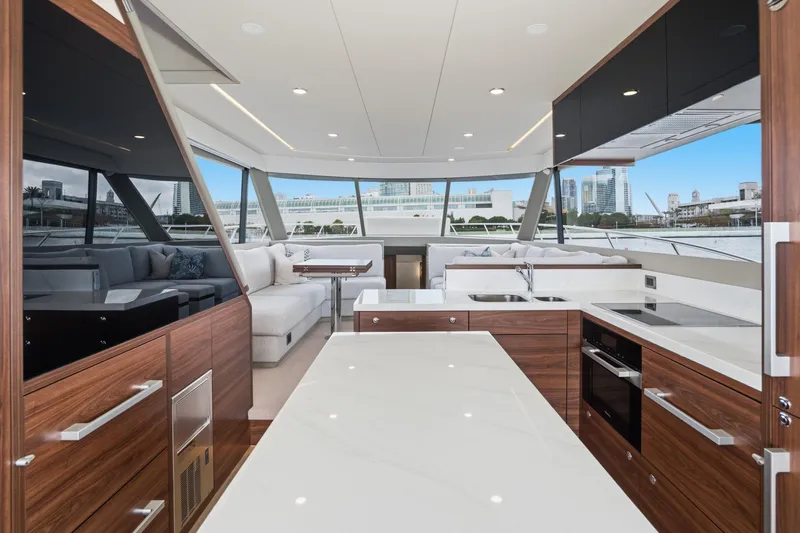 Slide: The Image of Luxurious interior of 2026 Maritimo M55 yacht with modern kitchen and panoramic windows. - 59