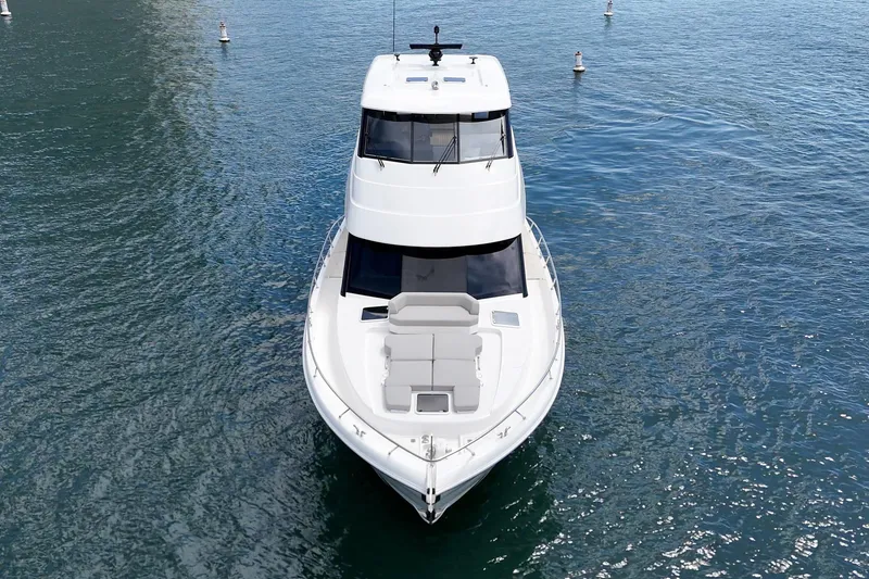Slide: The Image of 2026 Maritimo M55 yacht on calm water, aerial front view. - 72