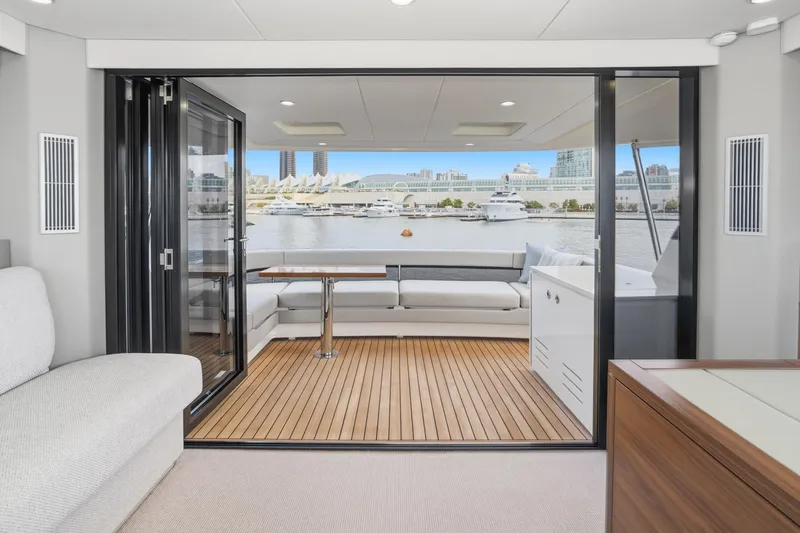 Slide: The Image of Luxurious interior of 2026 Maritimo M55 yacht with waterfront view. - 79