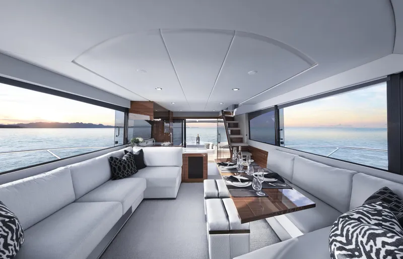 Slide: The Image of Luxurious interior of 2026 Maritimo M55 yacht with elegant seating and ocean view. - 8