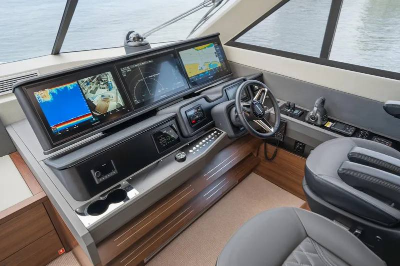 Slide: The Image of Helm of 2026 Maritimo M55 yacht with advanced navigation displays and controls. - 87
