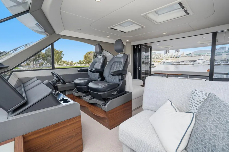 Slide: The Image of Luxurious interior of 2026 Maritimo M55 yacht with plush seating and modern helm. - 89