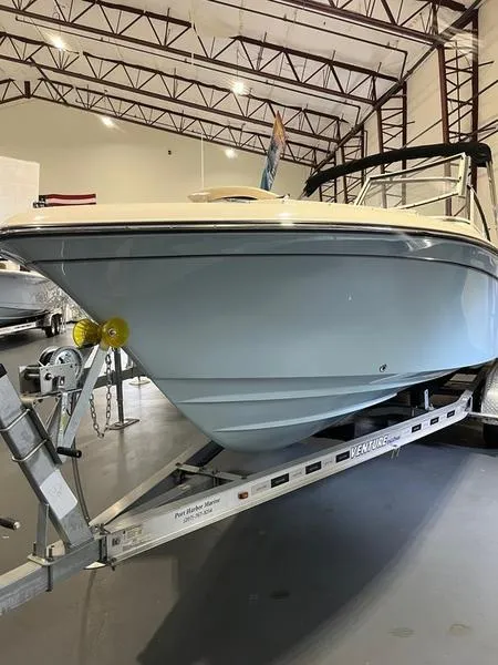 Slide: The Image of 2024 Grady-White Freedom 215 boat on trailer in indoor storage facility. - 4
