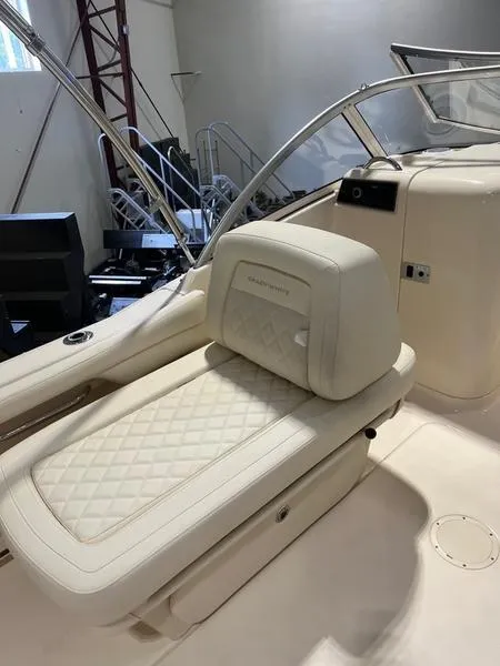 Slide: The Image of 2024 Grady-White Freedom 215 boat interior with luxurious seating and modern design. - 9
