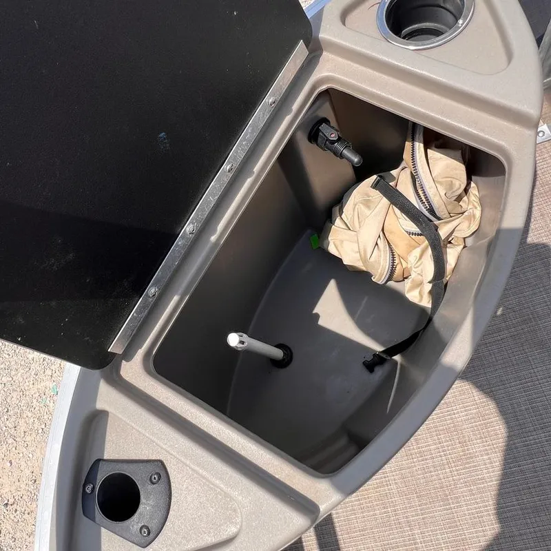 Slide: The Image of Storage compartment of 2023 Sun Tracker Party Barge 18 DLX pontoon boat. - 17