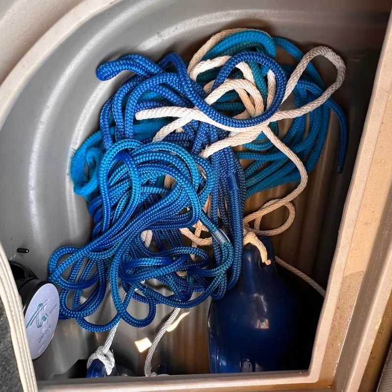 Slide: The Image of Ropes and fender storage on a 2023 Sun Tracker Party Barge 18 DLX. - 19