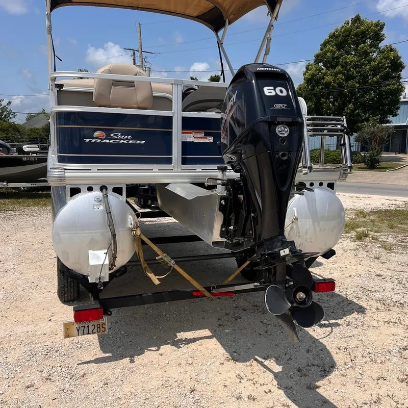 Slide: The Image of 2023 Sun Tracker Party Barge 18 DLX pontoon boat with 60 HP Mercury outboard motor. - 3