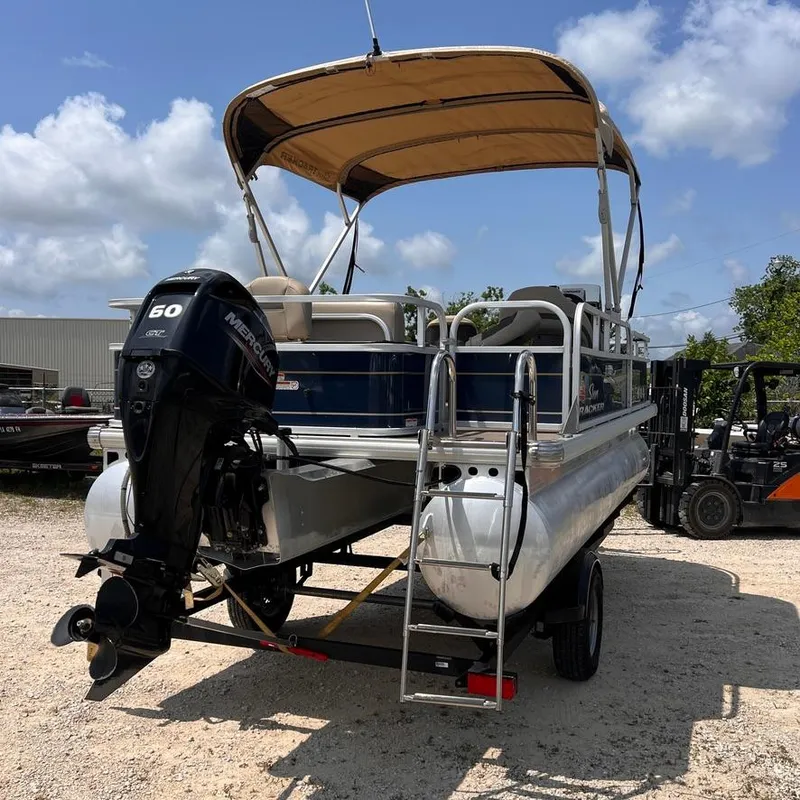 Slide: The Image of 2023 Sun Tracker Party Barge 18 DLX pontoon boat with Mercury 60 HP engine. - 5