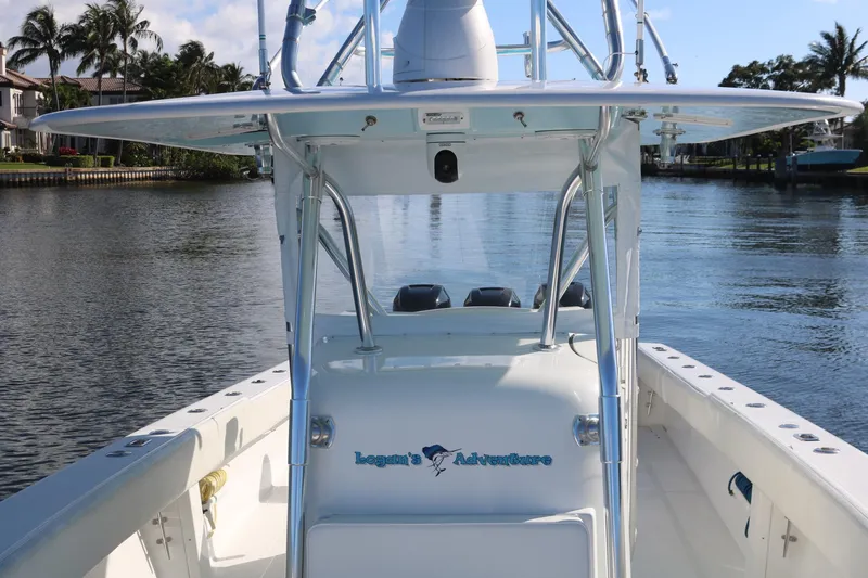 Slide: The Image of 2008 Venture 39 Center Console boat on calm water. - 11