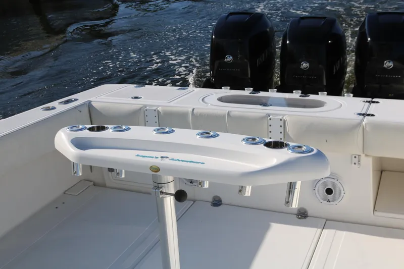 Slide: The Image of 2008 Venture 39 Center Console boat with triple outboard engines. - 15