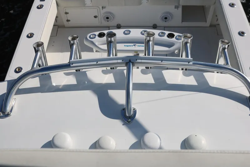 Slide: The Image of 2008 Venture 39 Center Console boat with rod holders and control panel. - 25