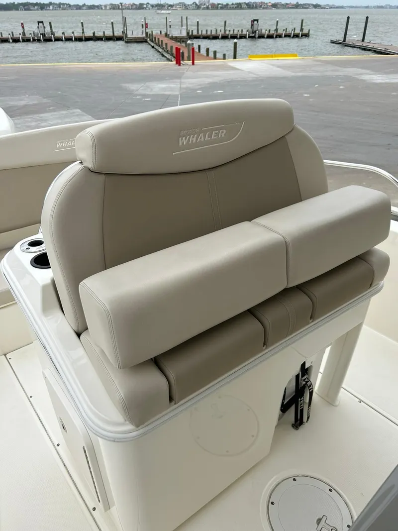 Slide: The Image of 2017 Boston Whaler 270 Dauntless boat seat with waterfront view. - 21