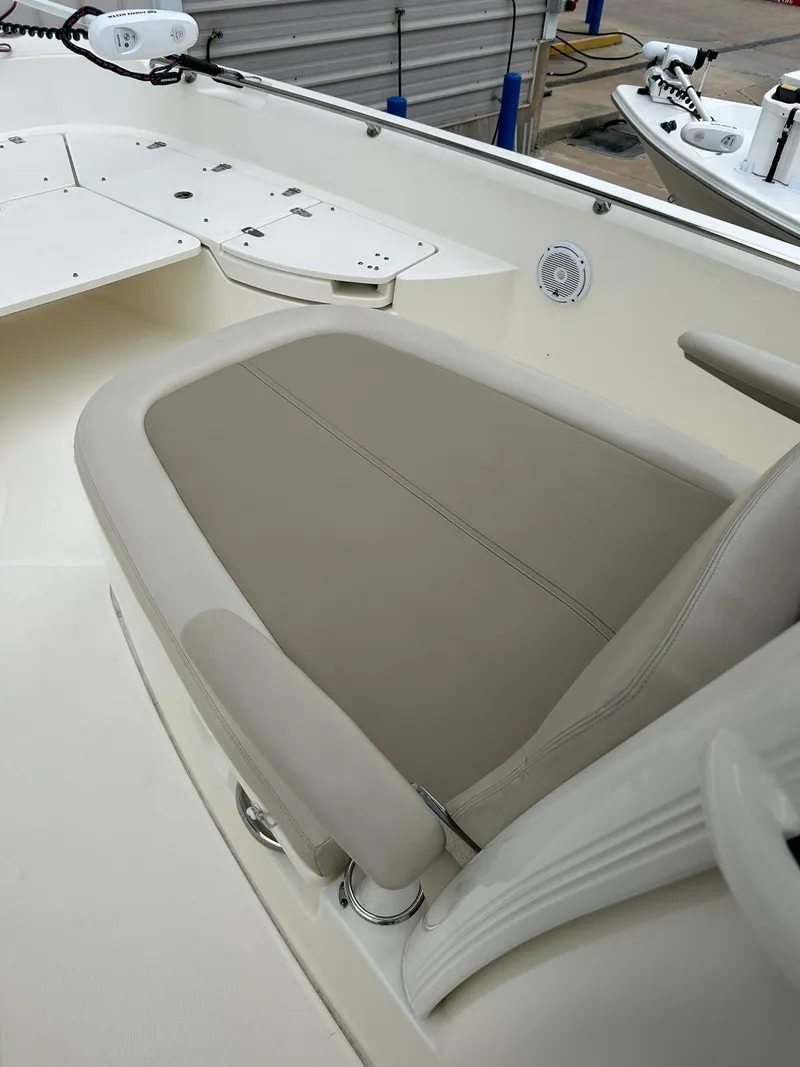 Slide: The Image of 2017 Boston Whaler 270 Dauntless boat seat with beige upholstery. - 28