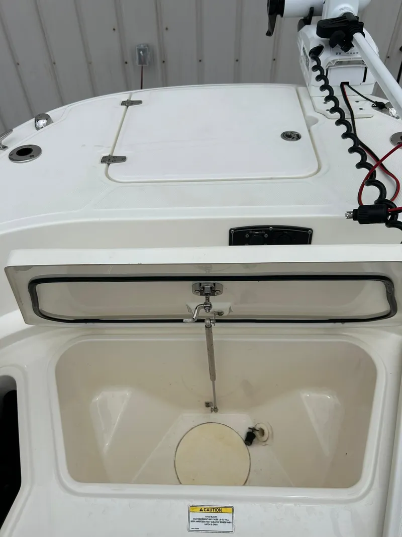 Slide: The Image of 2017 Boston Whaler 270 Dauntless boat storage compartment and hatch detail. - 34