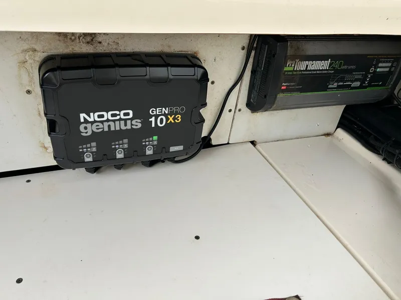 Slide: The Image of NOCO Genius GENPRO 10X3 charger installed on 2017 Boston Whaler 270 Dauntless boat. - 46