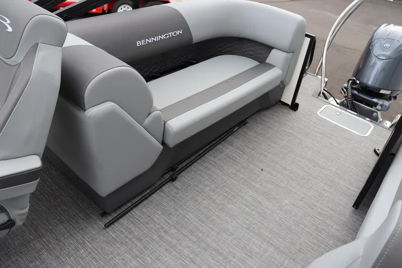 Slide: The Image of 2024 Bennington 22 SSR-SPS boat interior with gray seating and flooring. - 10