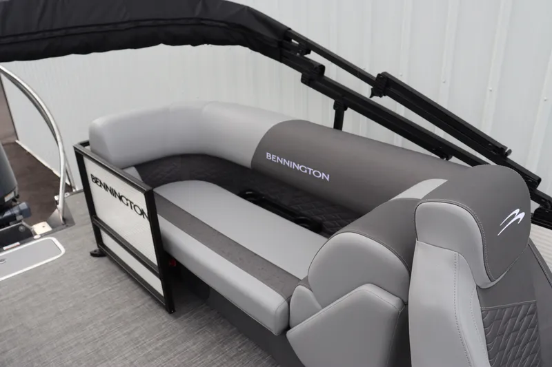 Slide: The Image of 2024 Bennington 22 SSR-SPS pontoon boat interior with gray seating. - 11
