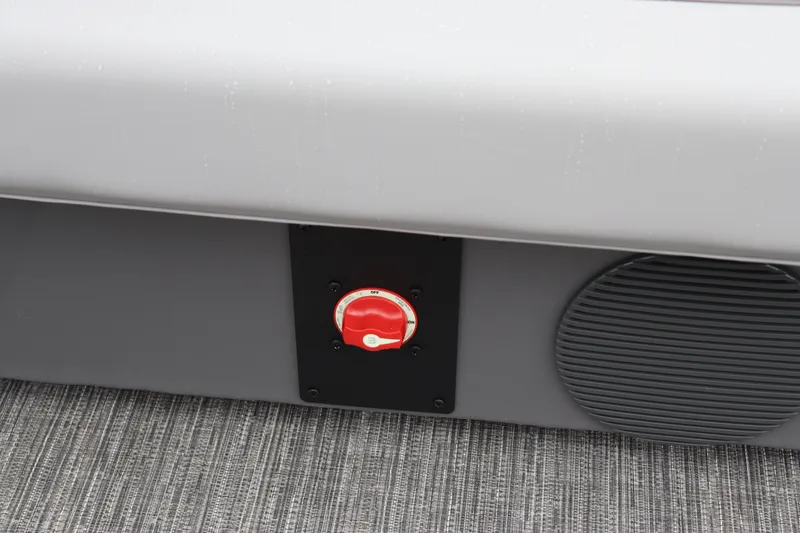 Slide: The Image of 2024 Bennington 22 SSR-SPS boat interior with red switch and speaker. - 22