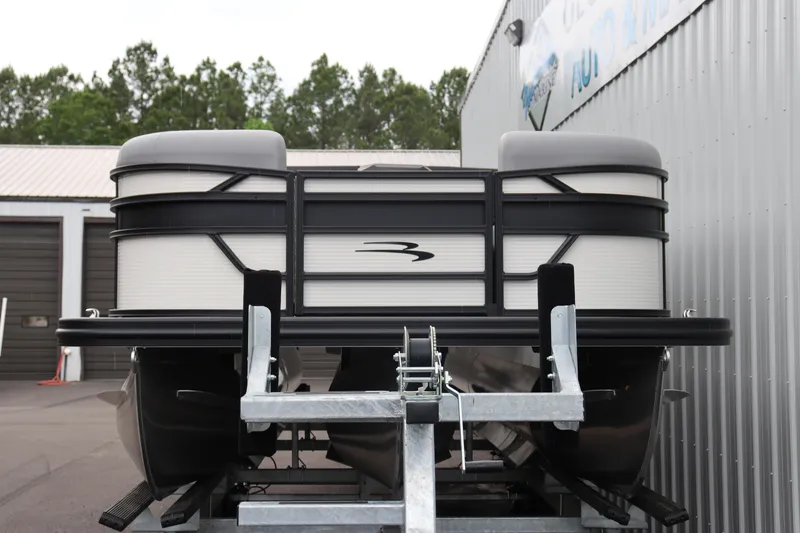 Slide: The Image of 2024 Bennington 22 SSR-SPS pontoon boat on a trailer. - 5
