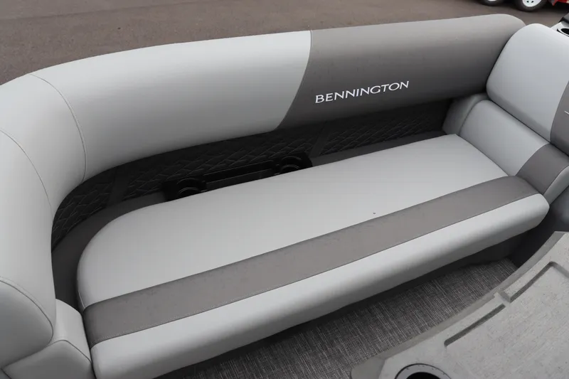 Slide: The Image of 2024 Bennington 22 SSR-SPS boat interior with gray cushioned seating. - 7