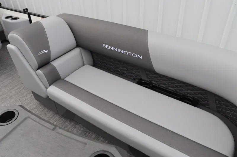 Slide: The Image of 2024 Bennington 22 SSR-SPS boat interior with gray cushioned seating. - 8