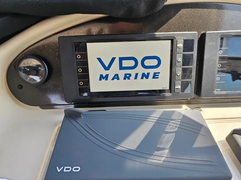 Slide: The Image of VDO Marine display on 2000 Cruisers 3870 Express dashboard. - 13