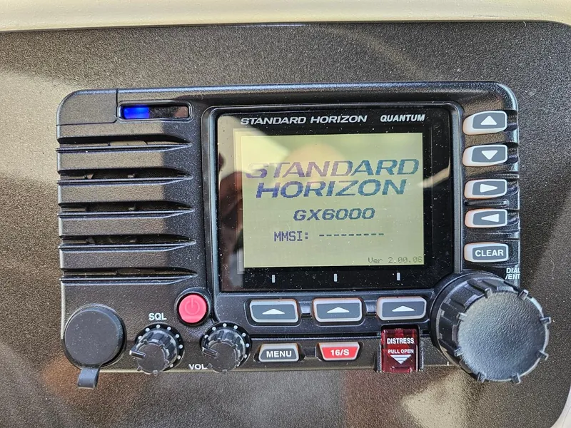 Slide: The Image of Standard Horizon GX6000 radio on 2000 Cruisers 3870 Express boat dashboard. - 14