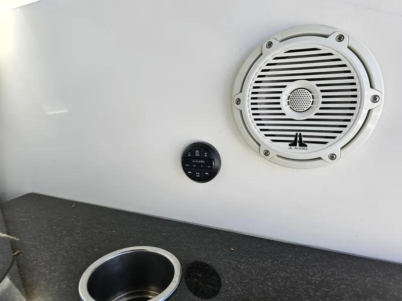 Slide: The Image of Speaker and control panel on 2000 Cruisers 3870 Express boat interior. - 16