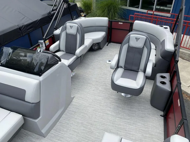 Slide: The Image of 2024 Viaggio Lago V-18U Bi-Toon boat interior with gray and white seating. - 10