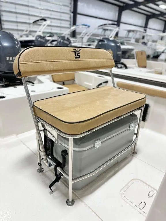 Slide: The Image of 2024 Carolina Skiff 19 LS boat interior with cushioned seating and storage. - 2