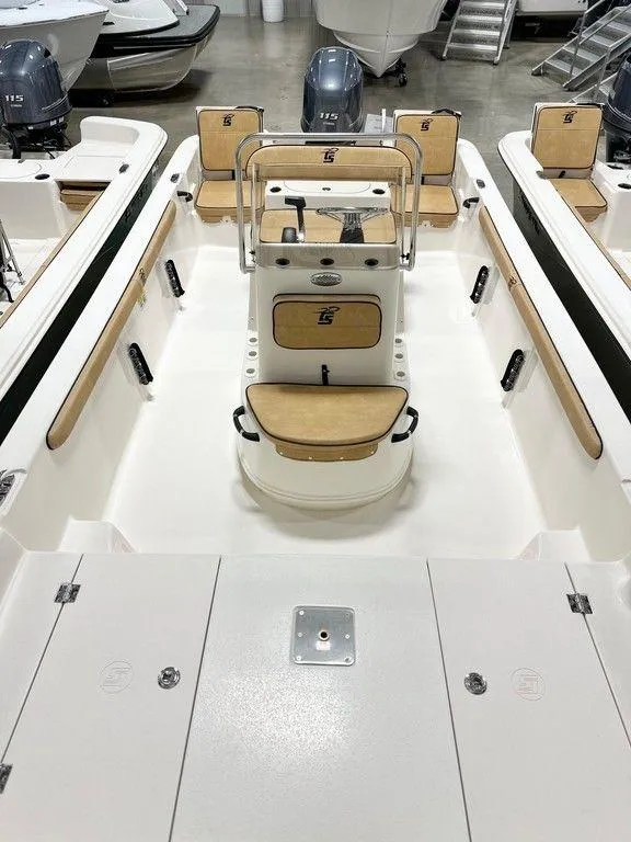 Slide: The Image of 2024 Carolina Skiff 19 LS boat interior with seating and console. - 7