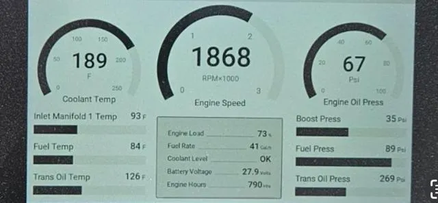 Slide: The Image of 2022 Custom Carolina Sportfish engine performance display showing coolant temp, engine speed, and oil pressure. - 28
