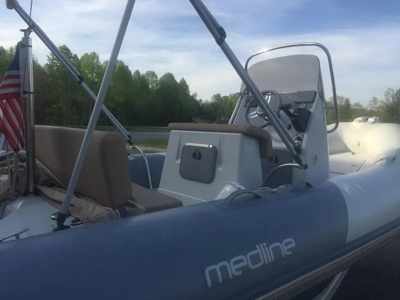 Slide: The Image of 2017 Zodiac Medline 580 inflatable boat with seating and steering console. - 3