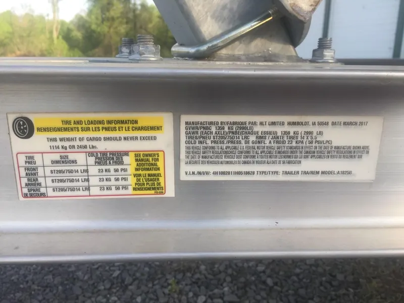 Slide: The Image of Tire and loading information on a 2017 Zodiac Medline 580 boat trailer. - 4