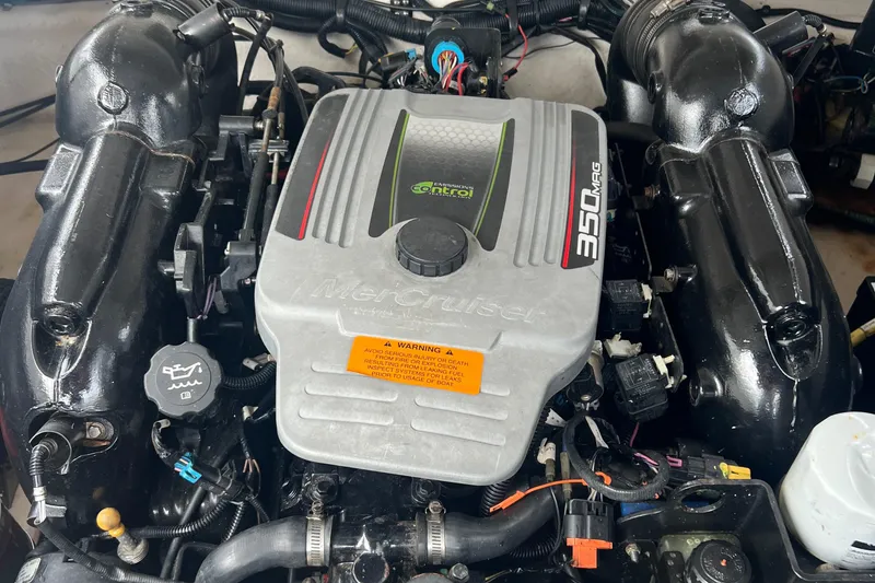 Slide: The Image of 2012 Chaparral 264 Sunesta boat engine, MerCruiser 350 MAG, close-up view. - 16